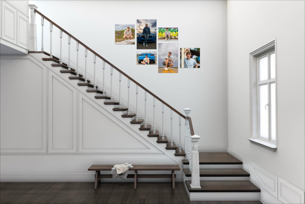 Gallery wall of framed portraits displayed on a staircase wall, the kind of artwork included in the cost of senior pictures in Lawrence KS