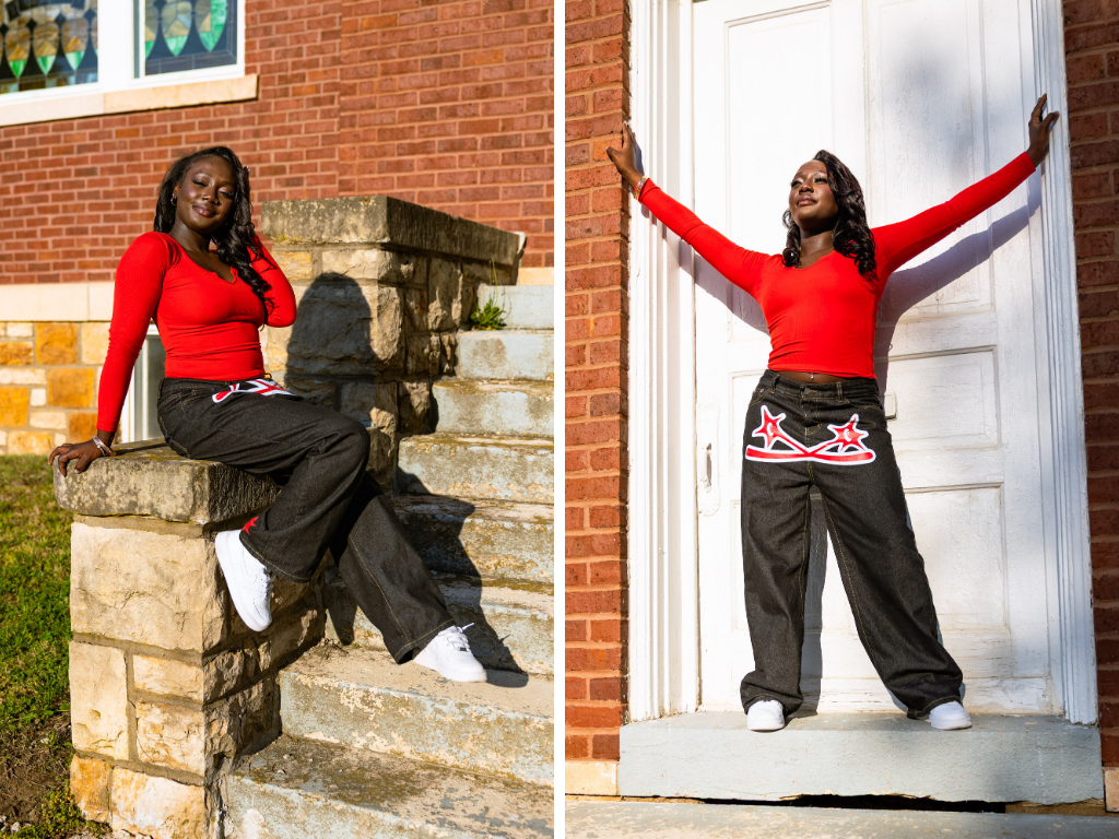 Tay in a red long-sleeve top and black star-print jeans on the stone steps of a brick Lawrence church, arms stretched wide in the white doorway.
