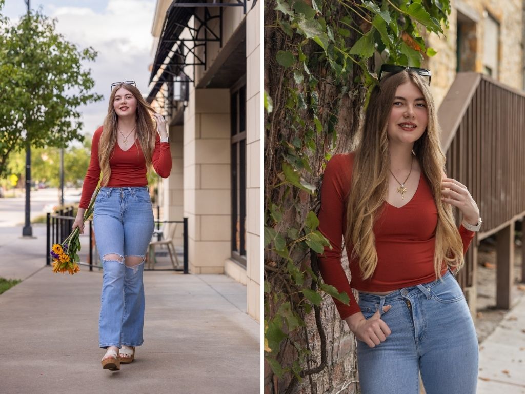 Lily walking a downtown sidewalk with sunflowers, and smiling beside an ivy-covered tree in a red top and jeans